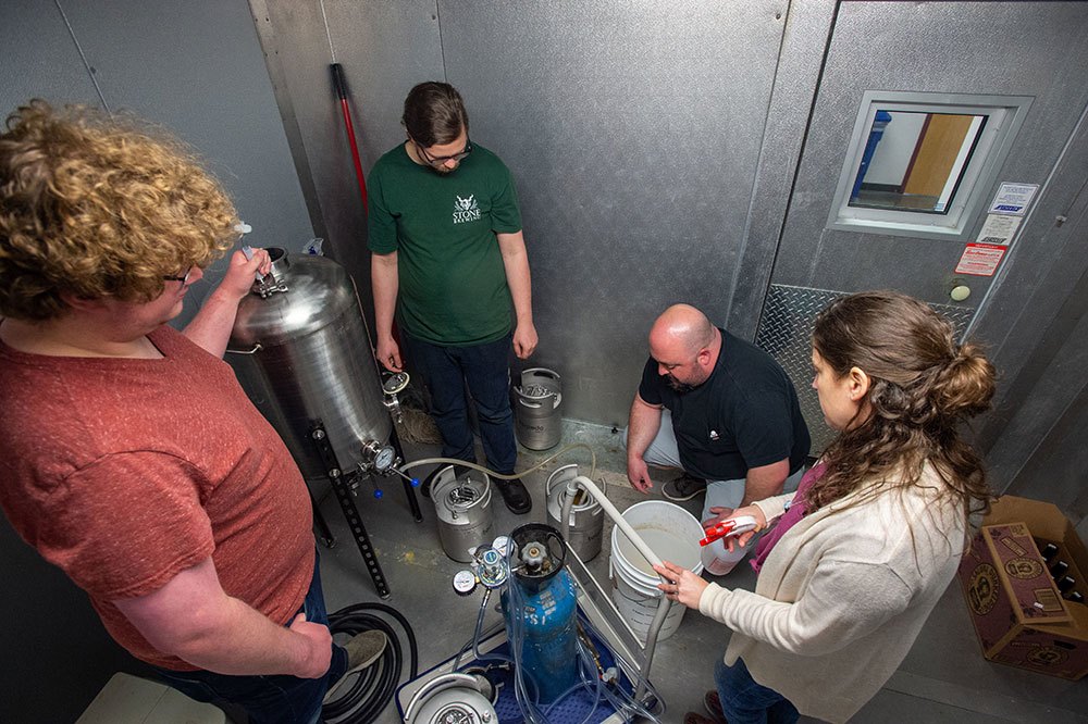 SIU Fermentation Science Students look over their latest batch of beer