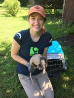 SIU Grad Student Holding Armadillo