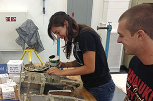students working on aircraft maintenance