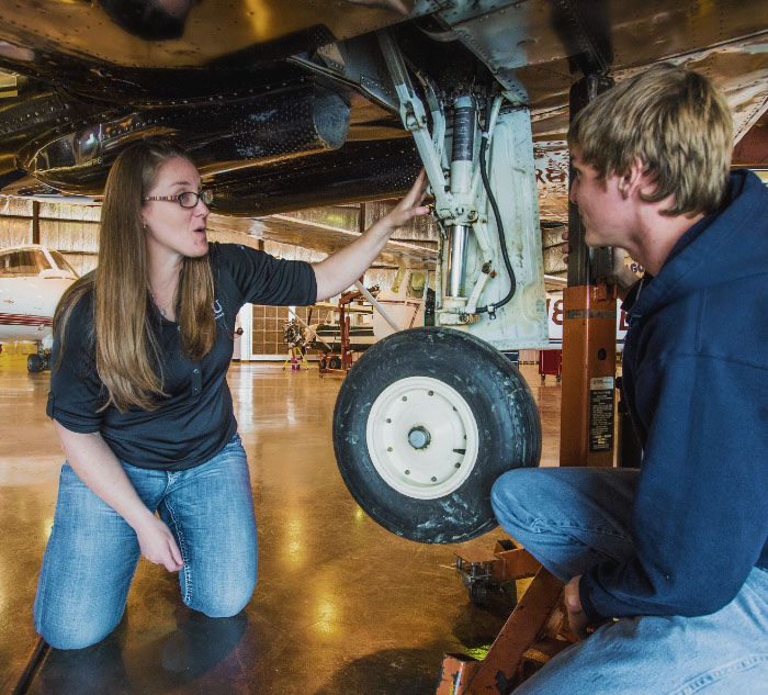 Students under wheel housing