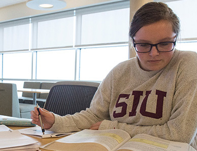siu student studying in library