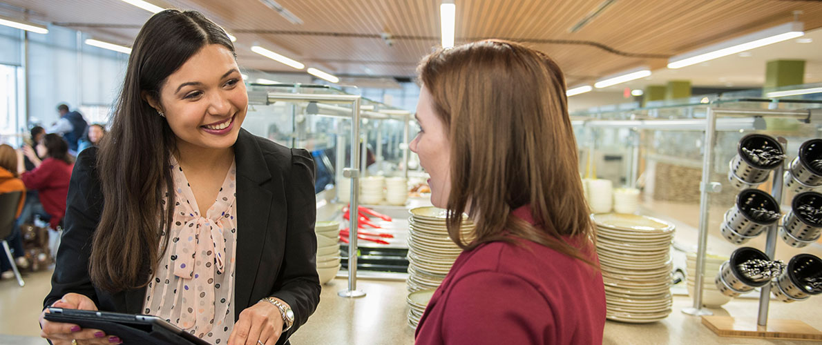 SIU Hospitality, Tourism, and Management Students prepare a food line