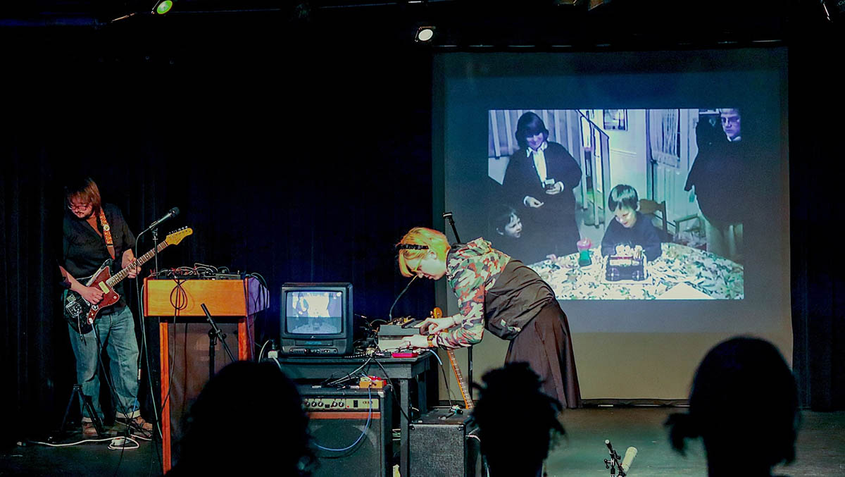 Performers take the stage during MFA graduate Jordan Faye Bardgett's exhibit