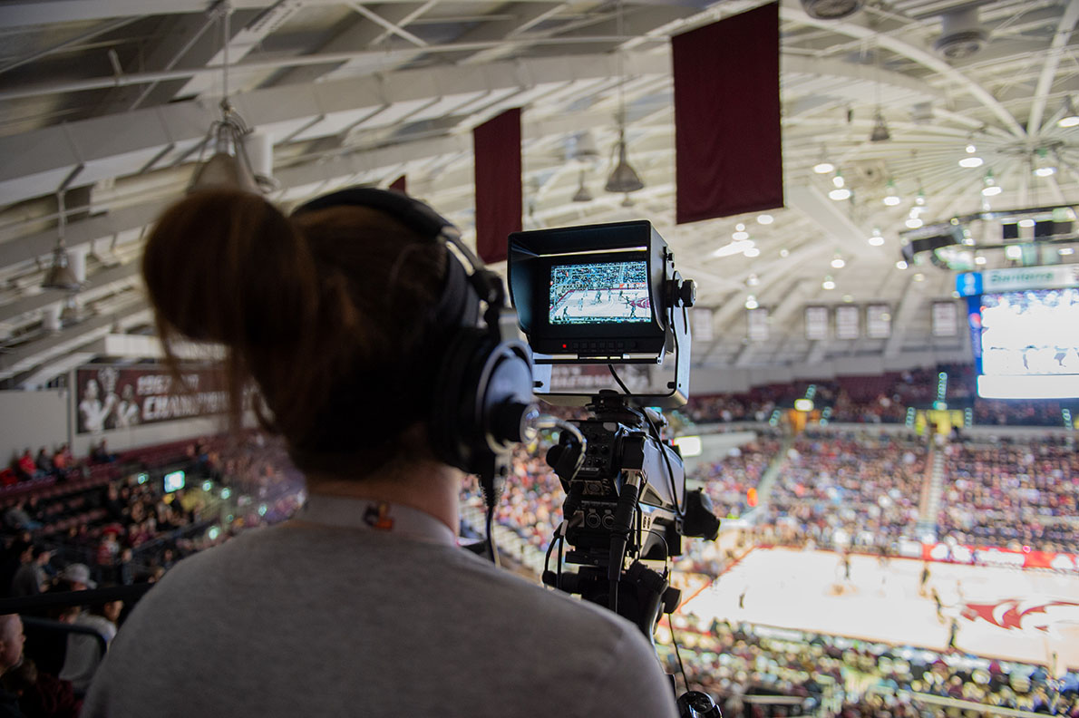 SIU Sports Media student at basketball game