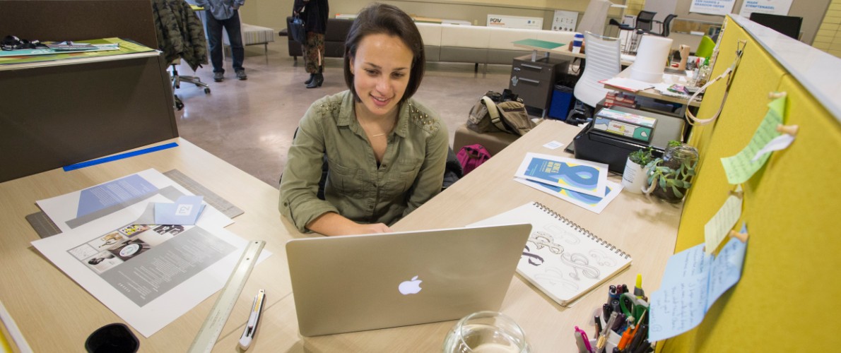 SIu Communication Design Degree student working on computer