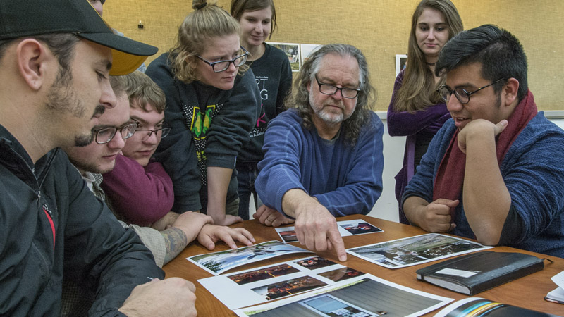 Photography professor with students