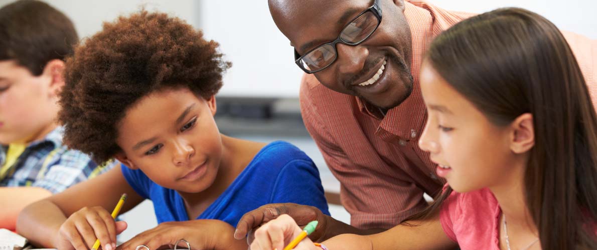 SIU teacher with young students