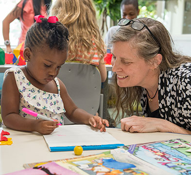 SIU Early Childhood Class work with Children in classroom