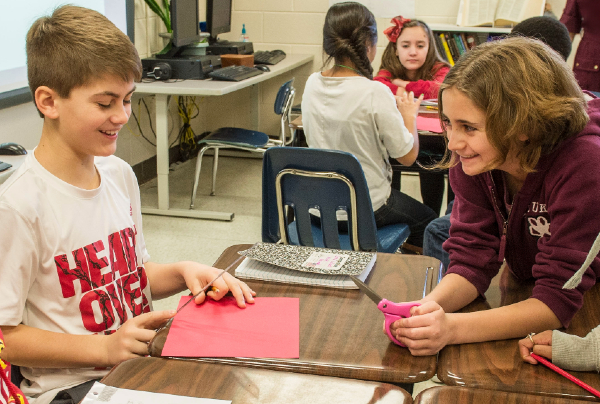 grade school students at desks