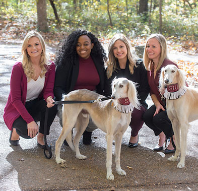 Group of Students with Saluki