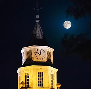 SIU Pulliam with a Full moon