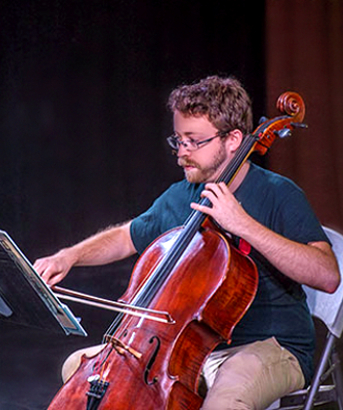 SIU Student playing Cello on stage