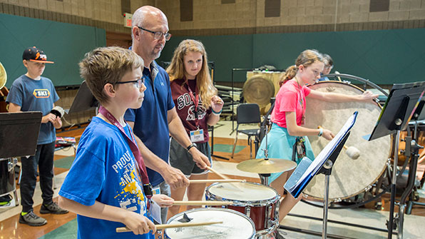 SIU School of Music work work with a group a kids