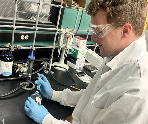 SIU Student working in Biochemistry lab