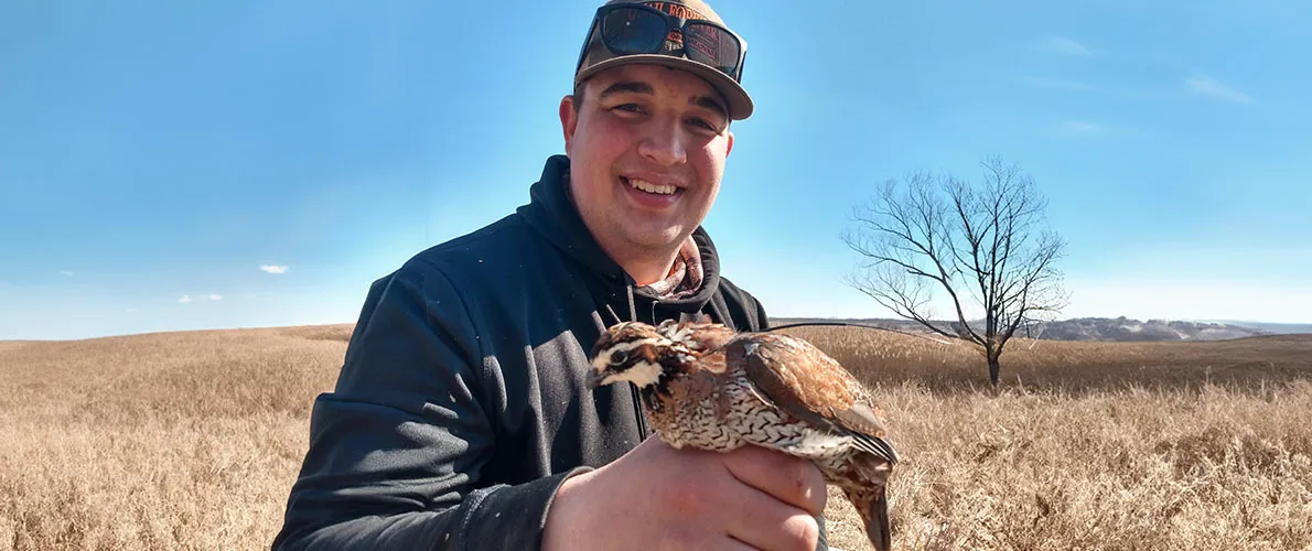 SIU Zoology student with quail